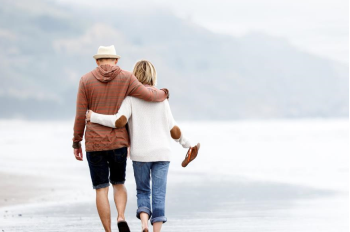 Couple walking on beach